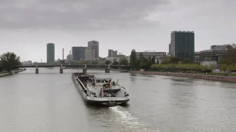 Barge going down Main river in Frankfurt Stock Footage 25210162