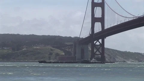 Barge going under the Golden Gate Bridge Stock Footage 78493956