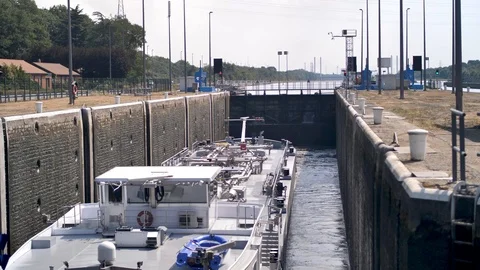Barge inside canal lock Stock Footage 92893488