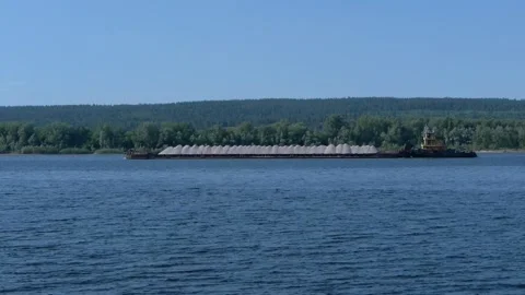 Barge loaded with rubble Stock Footage