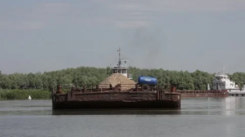 Barge loaded with sand  arriving to the docks Stock Footage 41342184