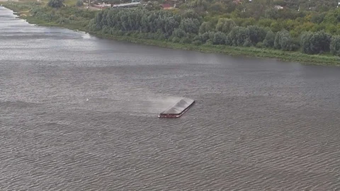 Barge on the river in severe windy rainstorm. Stock Footage 112934685