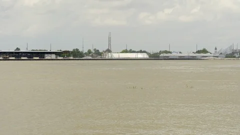 A barge sails down the Mississippi River Stock Footage 108339694