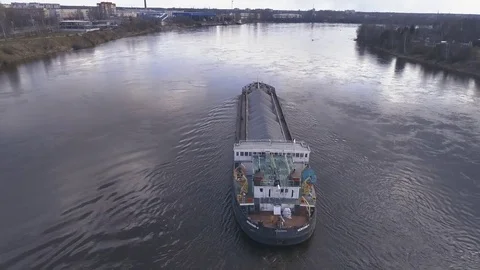 Barge with sand floats along the river Stock Footage 76873714