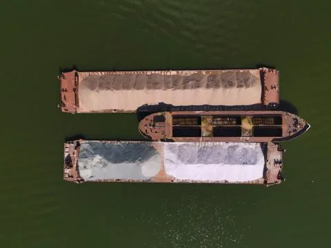Barge with sand on the river Stock Photos