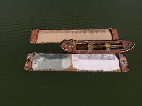 Barge with sand on the river Stock Photos