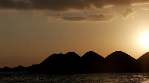 Barges full coal pass through the river at sunset Stock Footage 113346093