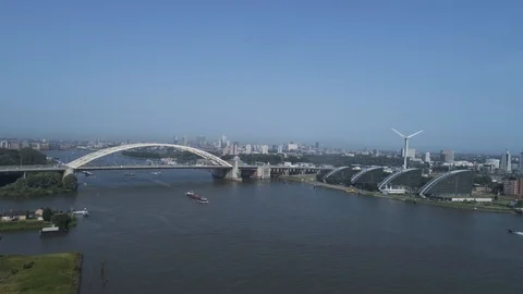 Barges under the Van Brienenoordbrug bridge in Rotterdam, Netherlands Stock Footage 113215841