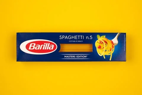 Barilla spaghetti packet, yellow background Stock Photos
