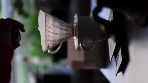 Barista adding grinded coffee and water 库存影片 139312356