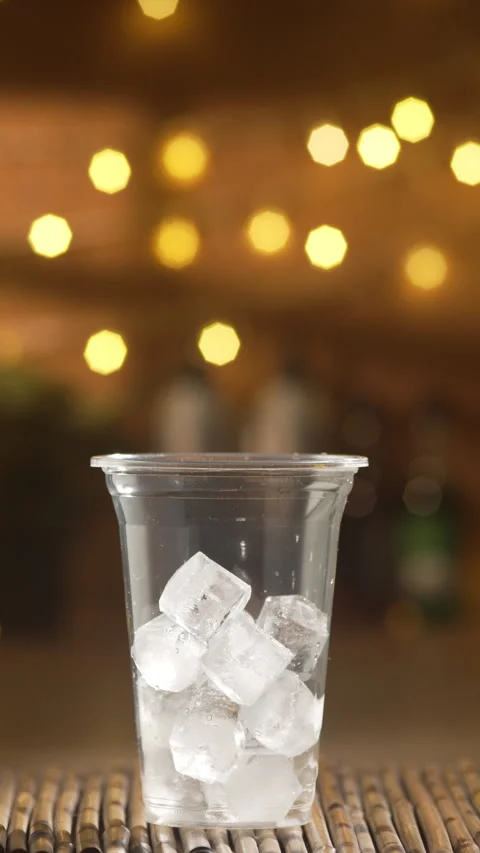 Barista Adding Ice Cubes For Bumble Coffee Stock Footage 338189911