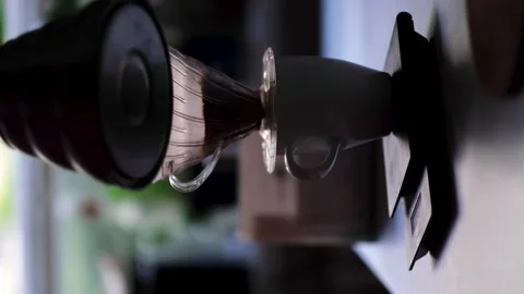 Barista adding second batch of water into filter coffee- vertical video 库存影片 139312391