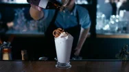 Barista Adding Syrup To A Milk Shake. 4K Cinemagraph -  Seamless Loop Stock Footage