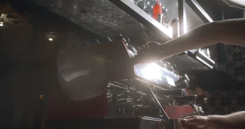 Barista is beating milk in coffee machine. 4K Slow Motion Video Stock Footage 114804415