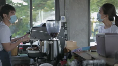 Barista concept of 4k Resolution. The staff are cleaning the cafe in the morn Stock Footage 155344584
