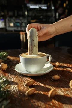 Barista with cream eclair Stockfoto's