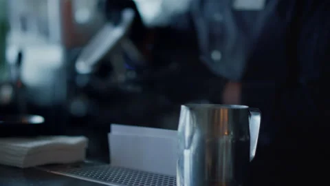 Barista hands serving coffee for client closeup. Barman putting plate spoon Video stock 201895597