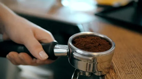 Barista Hands Using a Tamper To Press Freshly Ground Coffee Into a Coffee Tablet 스톡 동영상 66482568