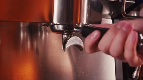 Barista inserts a holder with coffee into the coffee machine Vídeo Stock 158982140