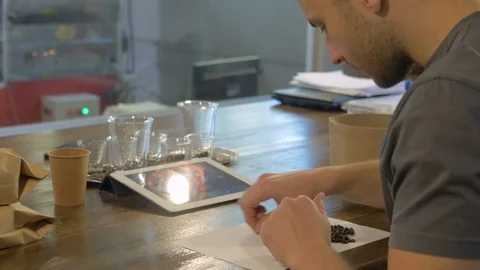Barista makes a blend of coffee. Stock Footage 82307330