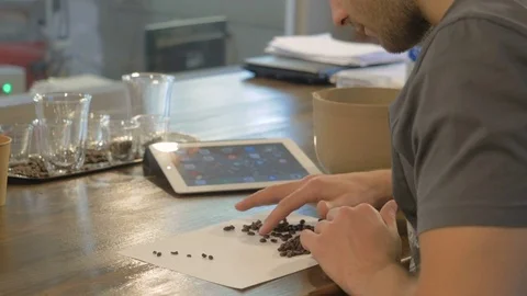 Barista makes a blend of coffee. Stock Footage 82307480