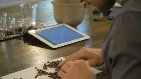 Barista makes a blend of coffee. Stock Footage 82504817