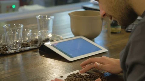 Barista makes a blend of coffee. Stock Footage 82504860