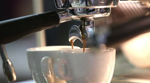 Young Beautiful Caucasian Barista Pouring Coffee With Syphon