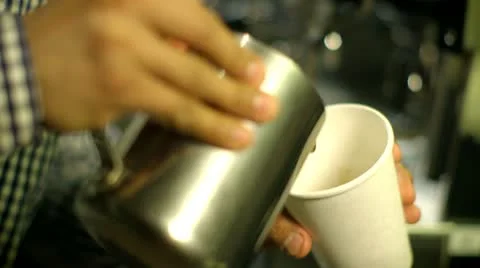 Barista makes coffee pattern into take away cup Video stock 22254804