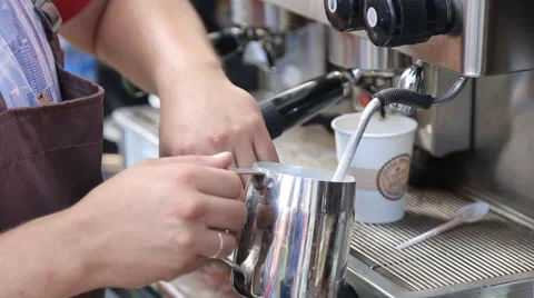 Barista makes coffees in coffee bar Stock Footage 67880146