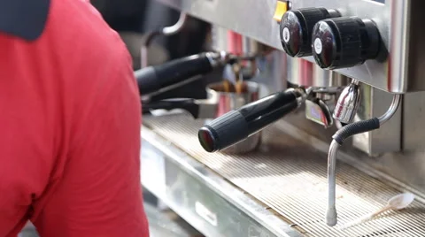 Barista makes coffees in coffee bar Stock Footage