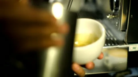 Barista makes pattern in coffee Stock Footage 22255322