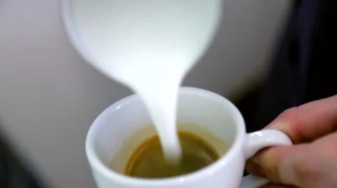 Barista makes pattern in coffee Stock Footage 66453981