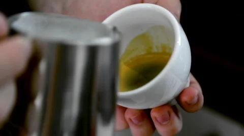Barista makes pattern in coffee Stock Footage 66454307