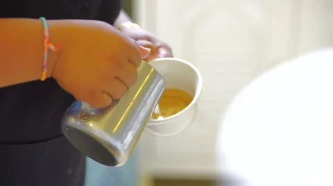 Barista makes pattern in coffee Stock Footage 68173576