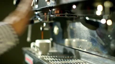 Barista makes two coffees in coffee bar Stock Footage 22252153