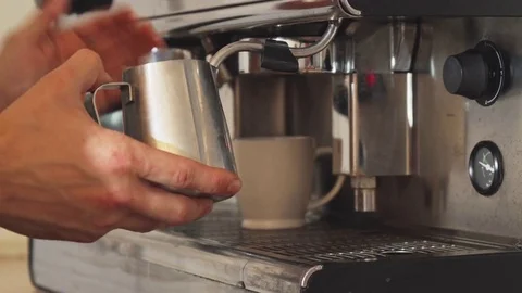 The barista is making boiled milk Stock Footage 80278809