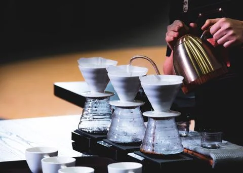 Barista is making coffee, coffee preparing with chemex, Chemex Dripping hot f Stock Photos