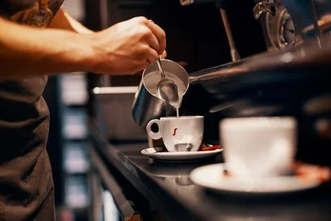 Barista making coffee Stock Photos