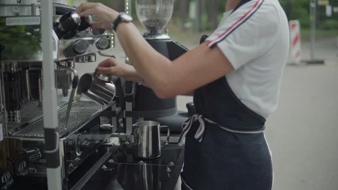 Barista making coffee using professional espresso machine. Work in details. 動画素材 116333577