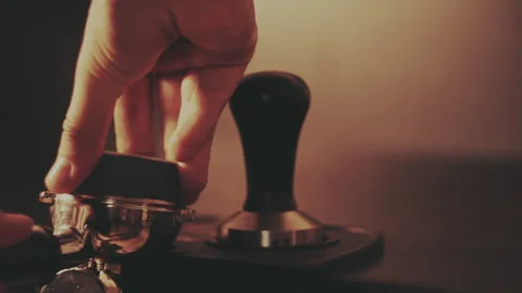 Barista making a cup of strong coffee in a coffee machine Stock Footage 156041385