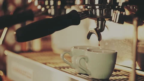 Barista making a cup of strong coffee in a coffee machine Stock Footage 157019996
