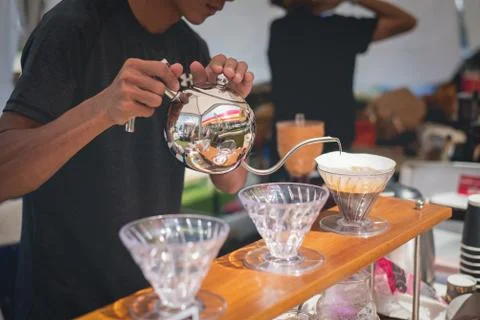 Barista making drift hot coffee Stock Photos
