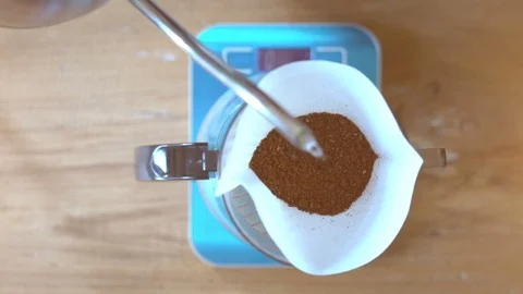 Barista making drip coffee in morning. light roast coffee Stock Footage 127486053