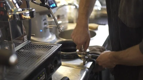 Barista making espresso with coffee machine Stock Footage 98240861