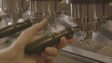 Barista Making Espresso with Coffee Machine in Sydney Cafe, Close Up of Hands Stock Footage 345692377
