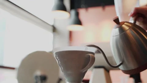 Barista man making craft filter drip coffee at bar in coffee shop. Stock Footage 159401612