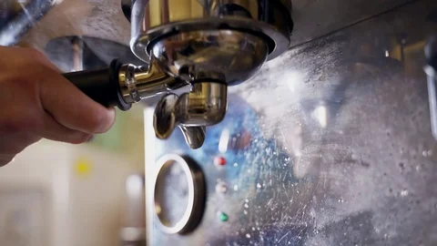 Barista man making double espresso, using filter holder. Stock Footage 116706641