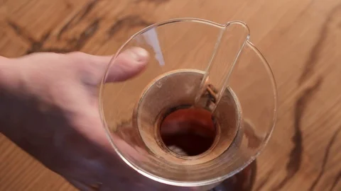 Barista mixing coffee. Alternative methods of brewing coffee. Video stock 126853070