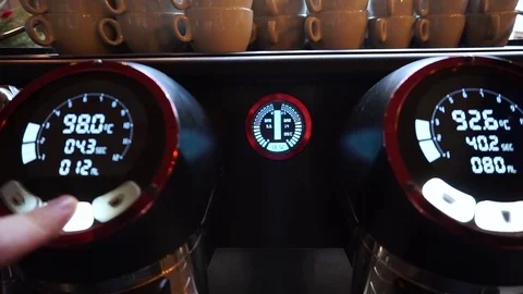 Barista operating modern digital professional coffee machine with dual monitors Video stock 84835990